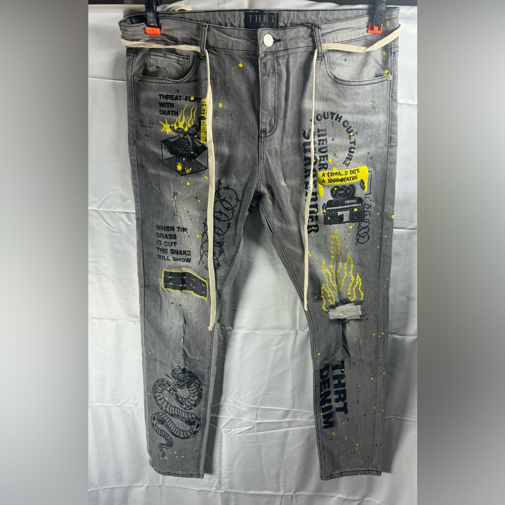 Grey THRT skinny jeans with graphic designs and Yellow design size 40 NWT